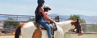 Teacher riding with a kid